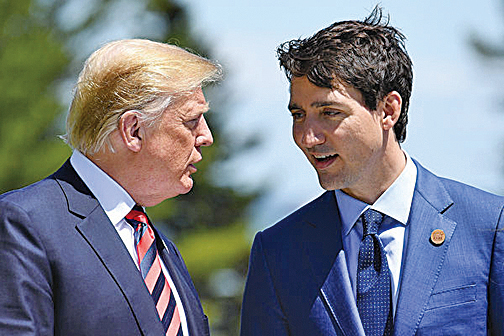 加拿大總理特魯多（右）與美國總統特朗普（左）共同譴責中共「任意拘押」兩名加拿大公民。（Getty Images）