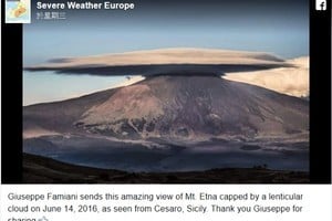 罕見現象 似飛碟巨大雲狀物罩住火山口