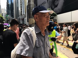 【法輪功反迫害20周年遊行】78歲陳伯：支持法輪功 相信善惡有報