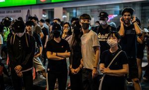 法媒：香港禁蒙面實施很困難 北京玩火自焚
