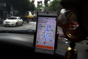 北京宣布「網約車」合法 Uber滴滴獲認可