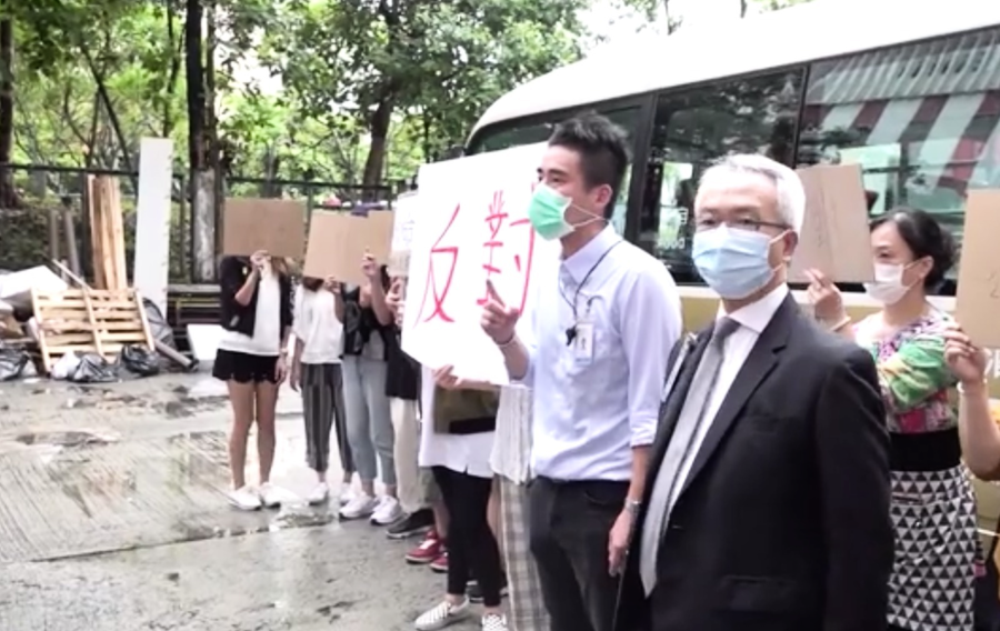 大陸檢測先遣隊抵大埔「華大基因香港」  往太平工業園遇抗議  11人被捕 