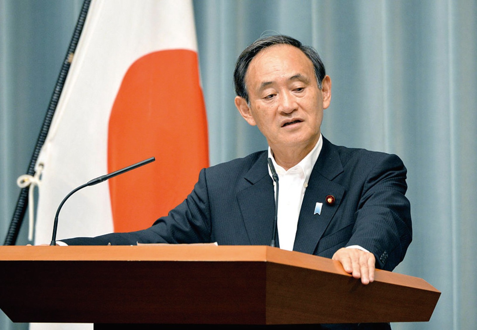 9月25日，日本首相菅義偉將與中共總書記習近平通電話，如何回應習近平訪日事宜成關注焦點。（AFP）