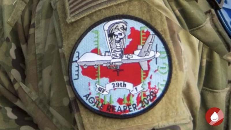 美軍死神無人機中隊為太平洋戰術軍演所設計的肩章，直接釋放武力滅共信號。（圖源自新唐人影片截圖）