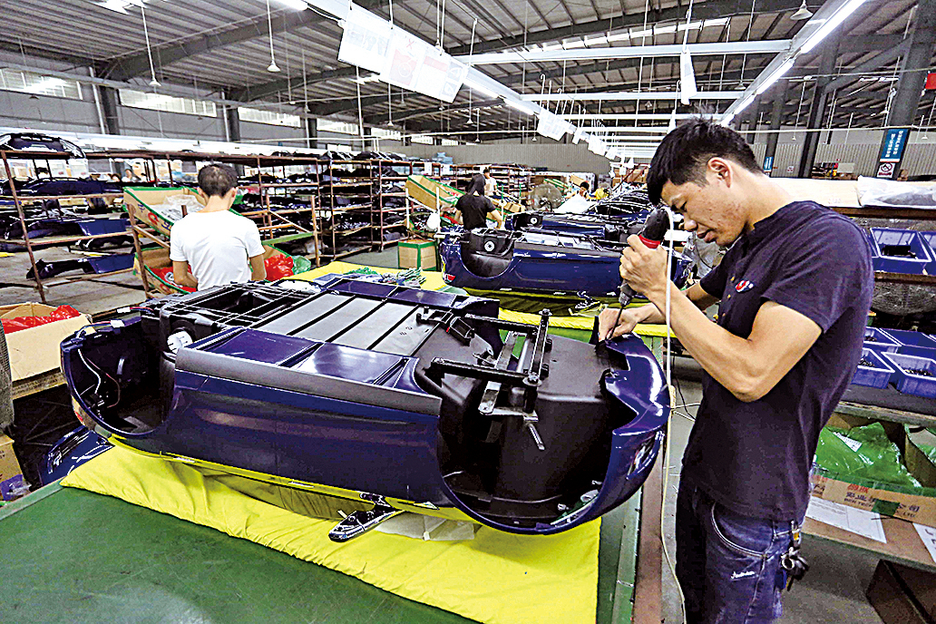 國務院總理李克強提出「中國製造」改革已「刻不容緩」。中共官媒馬上發文迎合稱「中國製造」已「轉型成功」。（AFP）