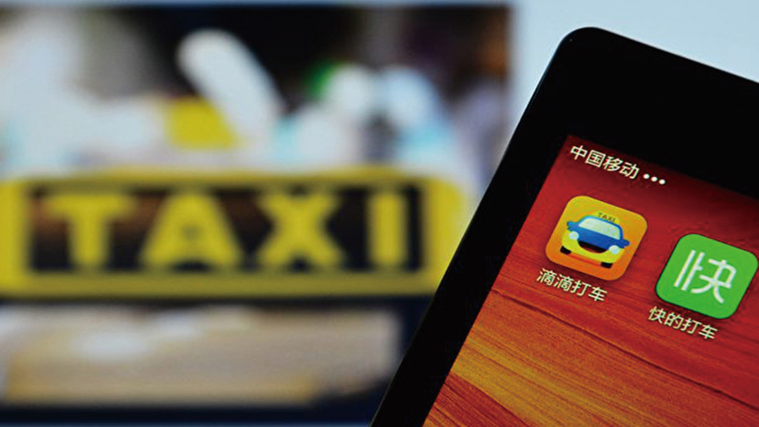 中國叫車服務公司滴滴出行打車App。（STR/Getty Images）