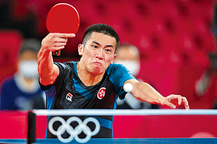 東奧運男子乒乓球單打第二輪，港隊代表林兆恆4:3獲勝。（JUNG YEON-JE／AFP） 