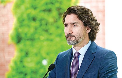 加拿大總理杜魯多於6月25日在加拿大渥太華舉行的記者會上發表講話。（AFP）