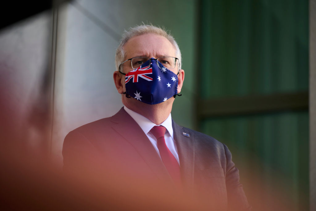 澳洲總理莫里森在各大城市爆發反封鎖遊行後，澳洲總理莫里森呼籲公眾在黎明前的黑暗中堅持下去。（Rohan Thomson/Getty Images）
