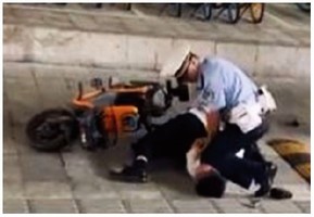 廣州警察當街跪壓男子頸部 引發輿論譴責