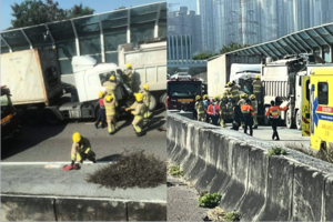 元朗公路四車交通意外 貨櫃車司機被困由消防員救出