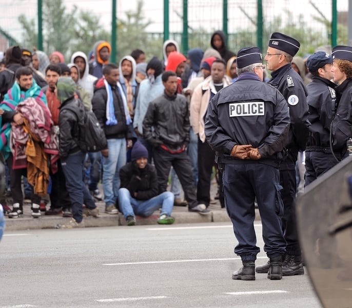 圖為在法國加萊的難民。（DENIS CHARLET/AFP/Getty Images）