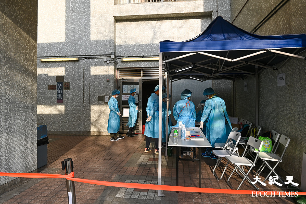 青衣長亨邨亨怡樓被圍封，居民須於今日晚上9時前接受核酸檢測。（宋碧龍／大紀元）