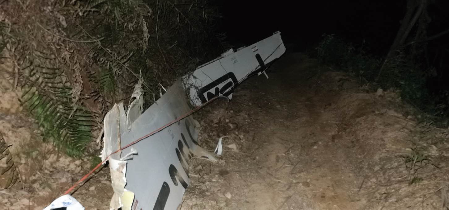 3月21日，廣西省梧州市籐縣，中國東方航空公司航班編號為MU 5735的波音737-800客機墜毀在山坡上。（STR/AFP）