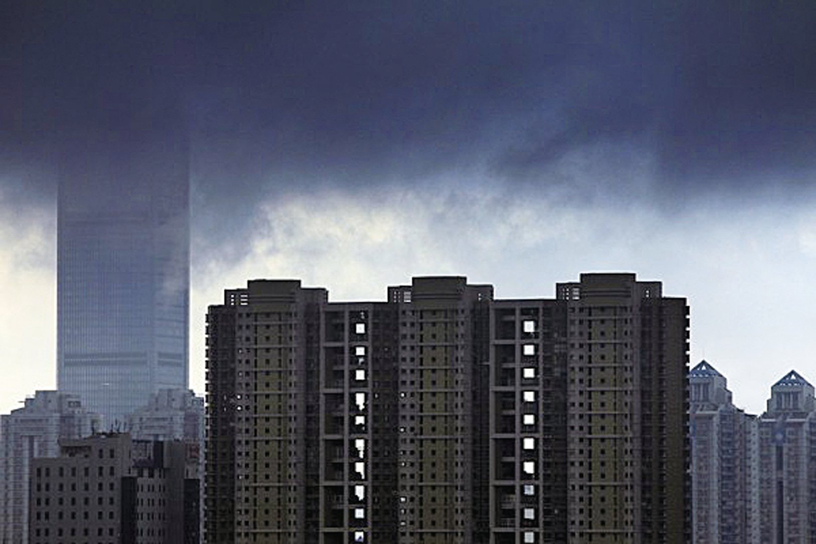 中國大陸出現爛尾樓停貸潮，有分析認為香港樓價可能也會下跌。（ChinaFotoPress/ChinaFotoPress via Getty Images）
