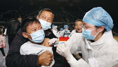 2021年11月9日，重慶市兒童在接種Covid-19疫苗。（AFP）