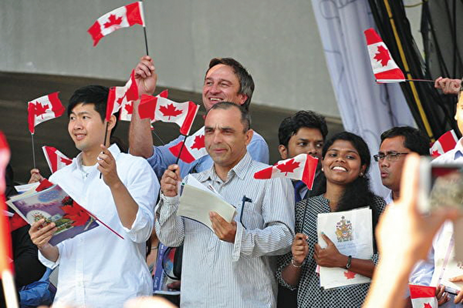 圖為加拿大公民入籍儀式現場。（加通社）