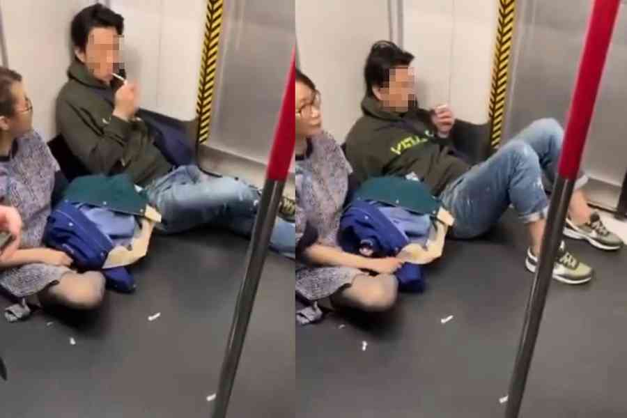 港鐵車廂內明目張膽吸煙 網民：一睇佢個樣就知好多心事