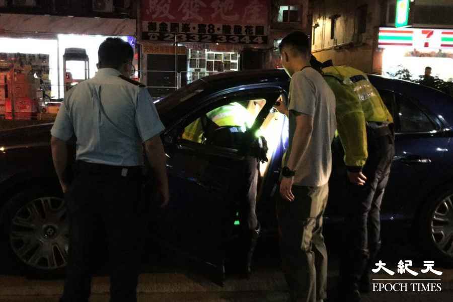 油麻地中港車遇查逃走 老公拒吹波 老婆幫手狂灌水