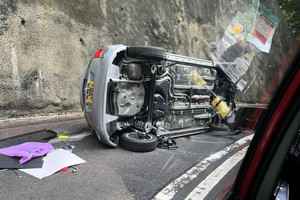 大潭道私家車疑自炒 兩人被困消防救出 一女受傷送院