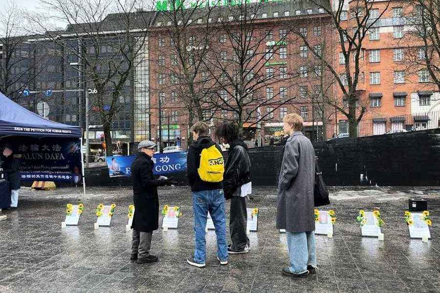 「國際大屠殺紀念日」 芬蘭法輪功學員揭露中共迫害