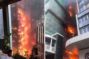 中環華懋大樓火災釀4人受傷 屋宇署：正調查棚架保護網是否合規