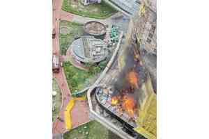 啟德地盤棚架起火 180名工人疏散無人傷亡