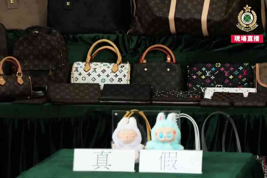 海關掃蕩廟街通菜街 拘7檔主檢百萬元冒牌貨