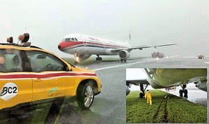 暴雨期間客機降落滑出跑道