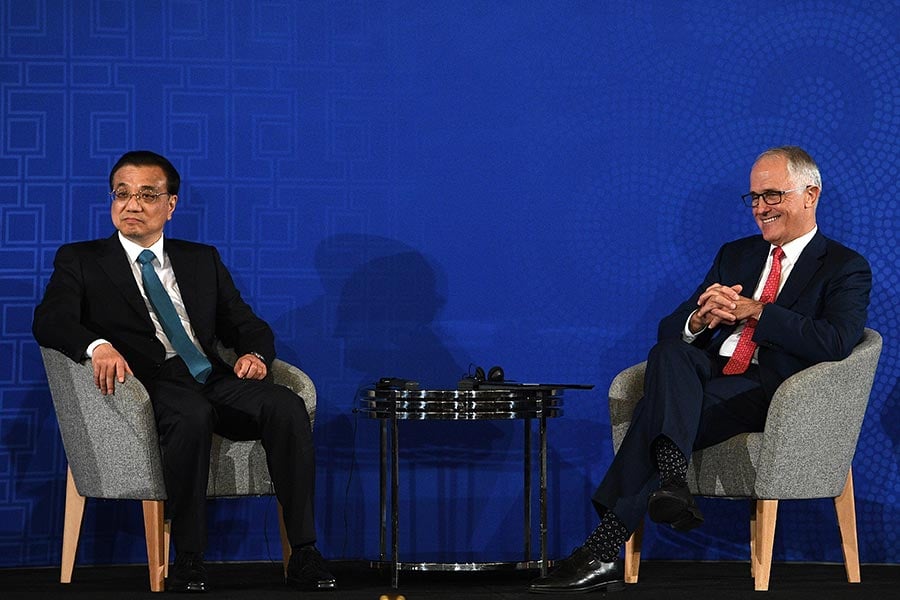 圖為今年3月24日，中共總理李克強與澳洲總理特恩布爾會晤，商談中澳貿易。（DAN HIMBRECHTS/AFP/Getty Images）