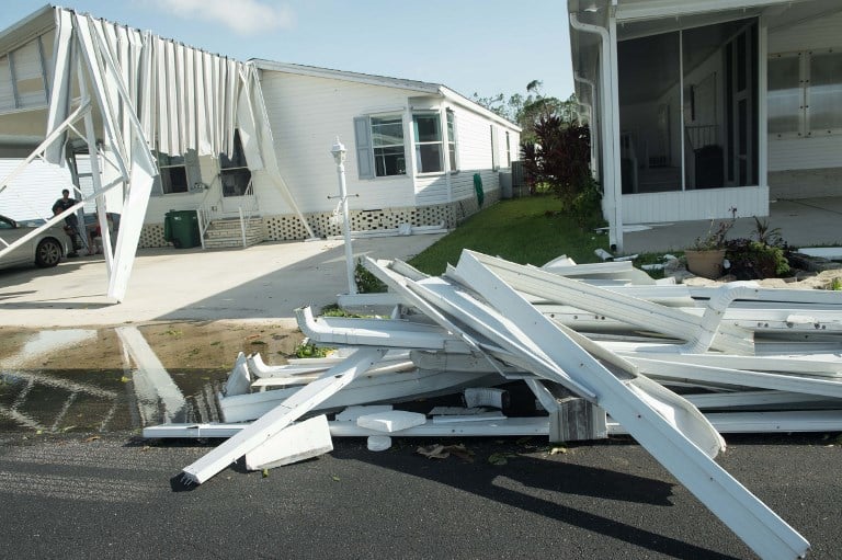 在佛羅里達州那不勒斯因颶風艾爾瑪受損的房屋。攝於9月11日。（AFP PHOTO / NICHOLAS KAMM）
