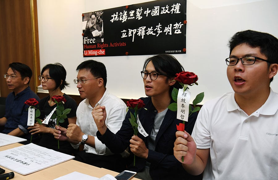 台灣人權促進會2日召開記者會質疑，李明哲很可能已被「秘密宣判」，要求政府應儘速確認，並維護李明哲上訴的權利。（中央社）
