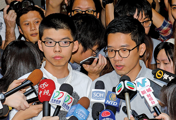 香港眾志秘書長黃之鋒接受美聯社採訪時，呼籲美國總統特朗普出訪亞洲時關注香港的人權問題。（大紀元資料圖片）