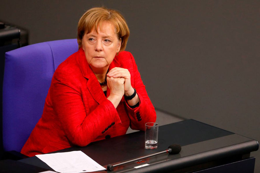 德國組閣聯合政府的僵局出現轉機，默克爾與社民黨主席舒爾茨將於本周就組閣政府會談。（ODD ANDERSEN/AFP/Getty Images）