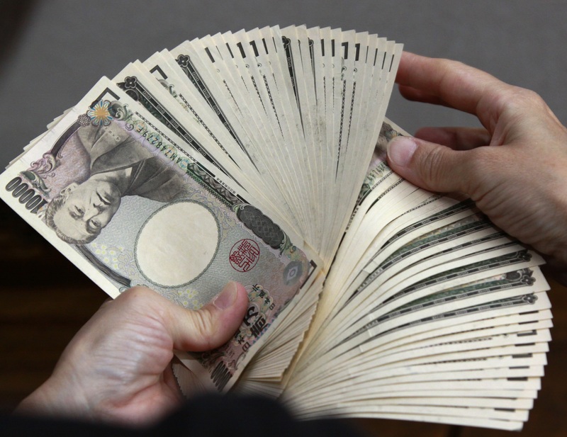 日圓兌美元從6日紐約匯市的107.14日圓兌1美元，貶到107.39日圓。（AFP）