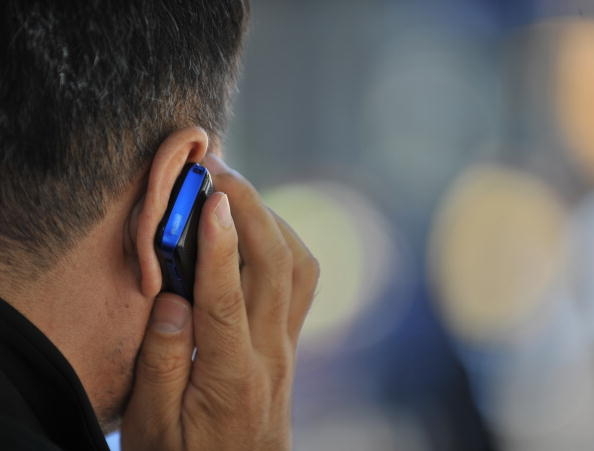 中國大陸的每一部電話、手機都處於當局監控之下，當然監控技術已經有了大幅提高，被竊聽者從電話中是聽不出來的。而出國仍在被監控中。（Getty Images）