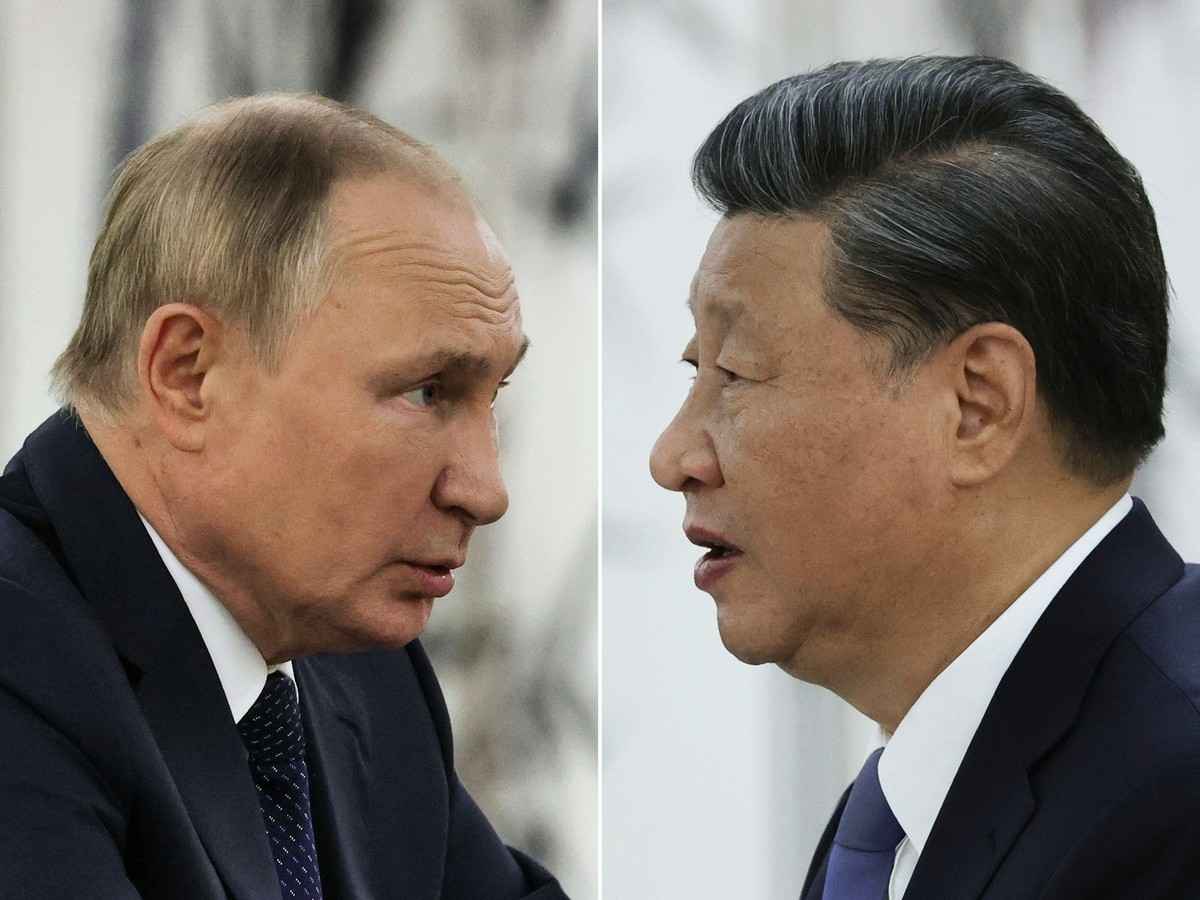 2022年9月15日，中、俄兩國領導人在烏茲別克舉行的上海合作組織峰會期間會晤。圖為現場合成圖。（Alexandr Demyanchuk/SPUTNIK/AFP via Getty Images）