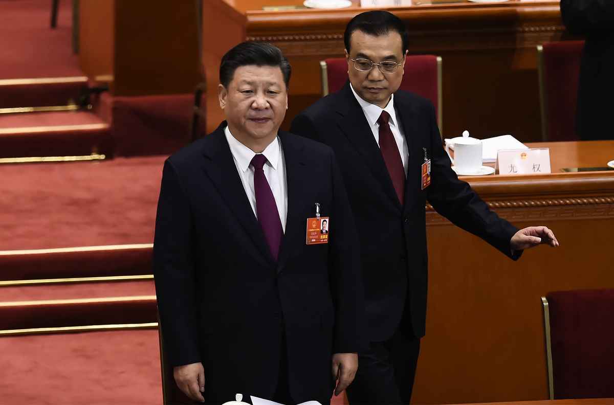 2018年3月5日，習近平和李克強（右）等在北京召開的中共人大會議上。（WANG ZHAO/AFP/Getty Images）