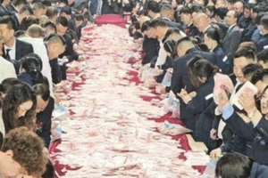 河南一企業年會6千萬現金鋪桌面 任員工領取