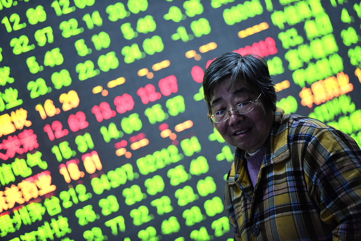 浙江杭州一家證券交易所中的股票市場走勢。（STR/AFP via Getty Images）