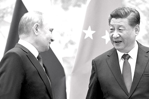 2022年2月4日，俄羅斯總統普京（左）和中國國家主席習近平在北京會晤時到場合照。（Alexei Druzhinin / Sputnik / AFP） （Photo by ALEXEI DRUZHININ/Sputnik/AFP via Getty Images）