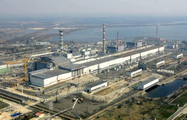 烏克蘭國家禁區管理機構發言人葉夫根尼婭·庫茲涅佐瓦（Yevgeniya Kuznetsovа）告訴CNN，俄羅斯軍隊周四（2022年2月24日）已經佔領了切爾諾貝爾（Chernobyl）核電站。從高空俯瞰烏克蘭切爾諾貝爾核電站。（MYKOLA LAZARENKO/AFP/Getty Images）
