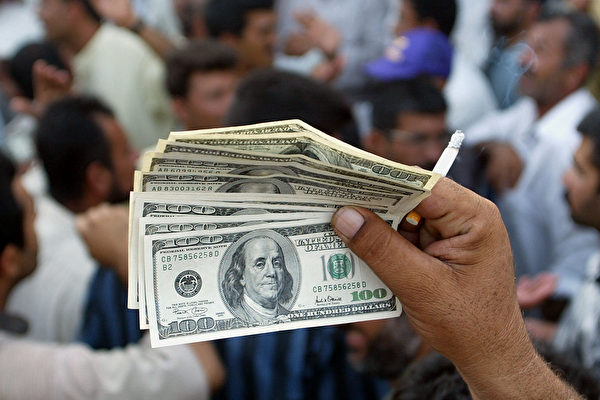 美聯儲在2022年連續加息，美元走強。（Timothy A. Clary/AFP）