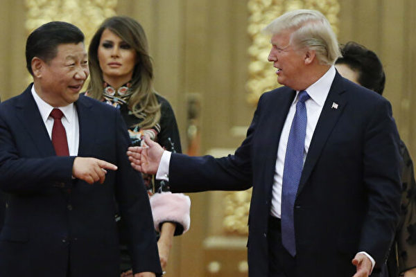 2017年11月9日，中共領導人習近平在北京人民大會堂舉行國宴，歡迎來訪的美國總統特朗普。（Thomas Peter/Getty Images）