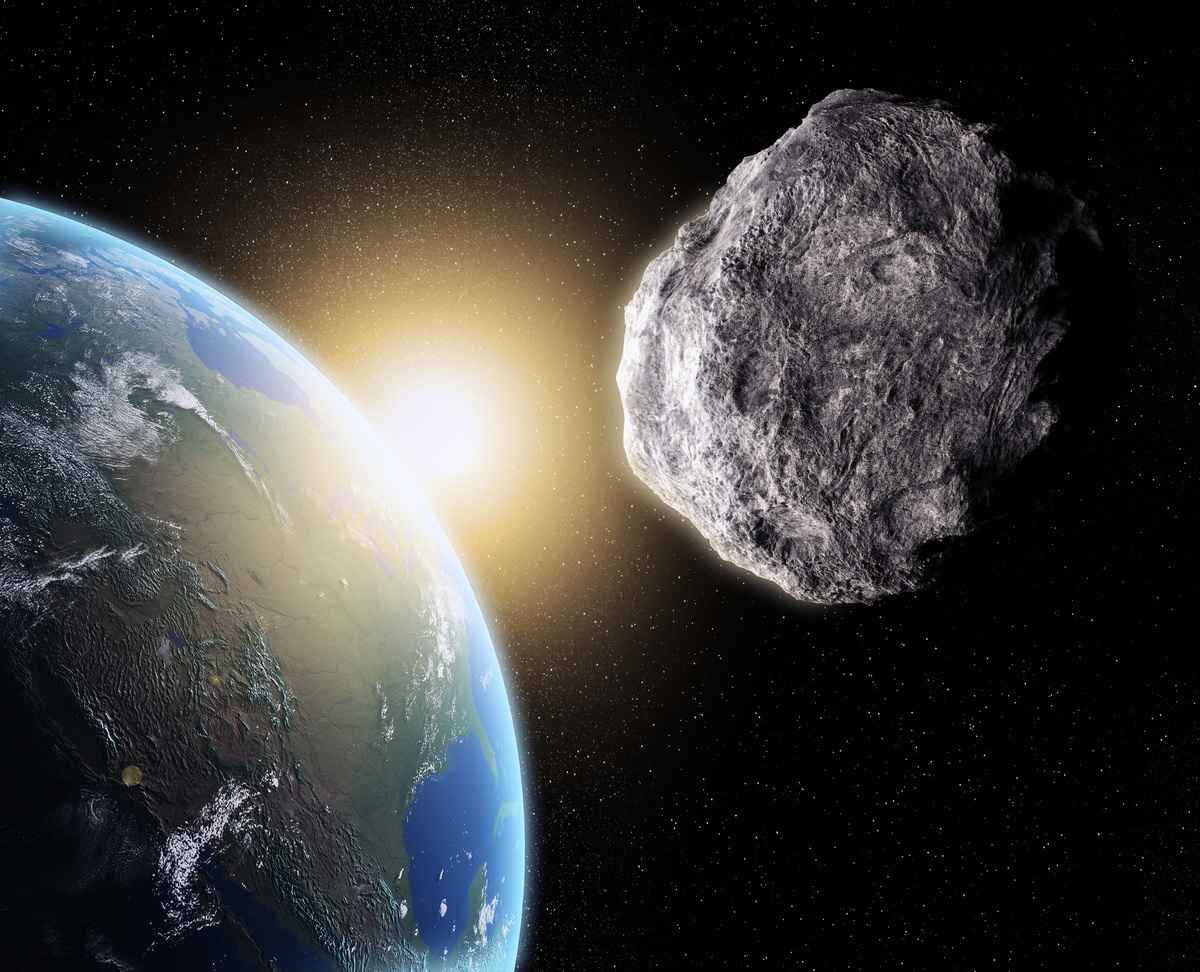小行星飛掠地球示意圖。（Shutterstock）