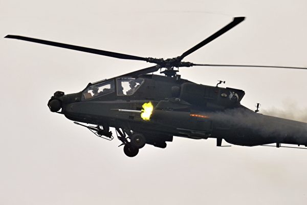 圖為阿帕奇武裝直升機。(JUNG YEON-JE/AFP)