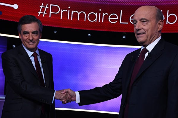 11月24日晚，法國右翼黨派總統候選人朱佩與菲永進行了最後一次電視公開辯論，誰勝誰負？11月27日選民二輪投票後將見分曉。（ERIC FEFERBERG/AFP/Getty Images）