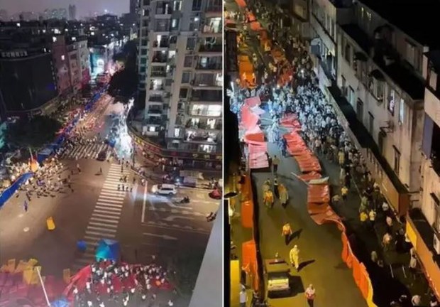 廣州海珠區居民抗議封控，人們推動水馬，衝到最外圍的卡點。（影片截圖）