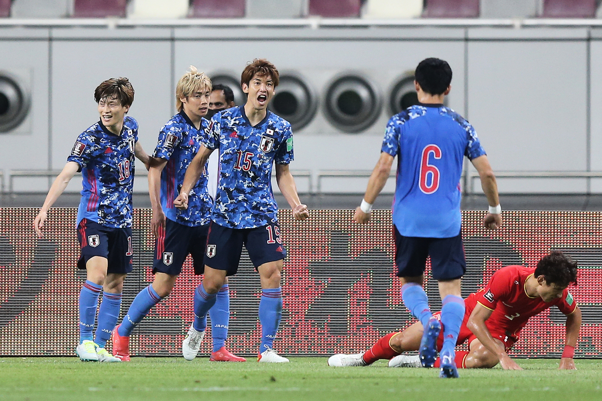 2022世界盃預選賽亞洲區12強賽，中國男足以0:1不敵日本，遭遇二連敗，B組墊底。日本球員大迫勇也（中）打進了本場比賽唯一入球。（Mohamed Farag/Getty Images）