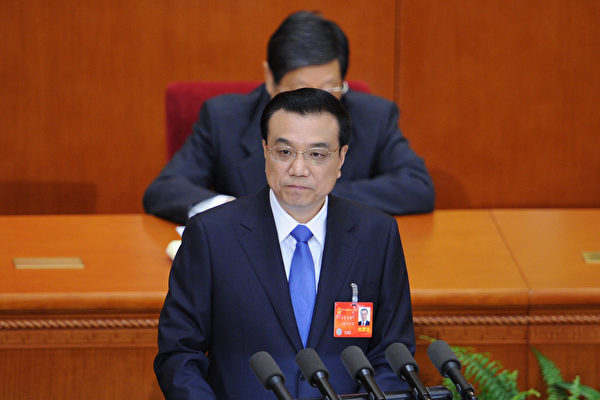 中共總理李克強在召開國務院常務會議時說，要樹立過「緊日子」的思想。分析人士說，這顯示中國經濟不斷惡化，步入寒冬。(WANG ZHAO/AFP/Getty Images)